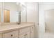 Clean bathroom with white vanity, sink and large mirror at 630 Darlington Commons Ne Ct, Atlanta, GA 30305