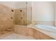 Elegant bathroom with a soaking tub and a walk-in shower at 630 Darlington Commons Ne Ct, Atlanta, GA 30305