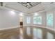 Primary bedroom with hardwood floors and ensuite bath access at 630 Darlington Commons Ne Ct, Atlanta, GA 30305