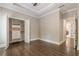 Bedroom with hardwood floors and walk-in closet at 630 Darlington Commons Ne Ct, Atlanta, GA 30305