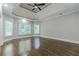 Bright bedroom featuring hardwood floors and a ceiling fan at 630 Darlington Commons Ne Ct, Atlanta, GA 30305