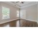 Bedroom with hardwood floors, ceiling fan and multiple windows at 630 Darlington Commons Ne Ct, Atlanta, GA 30305