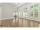 Spacious dining room with hardwood floors and large windows at 630 Darlington Commons Ne Ct, Atlanta, GA 30305