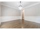 Formal dining room with hardwood floors, wainscoting, and chandelier at 630 Darlington Commons Ne Ct, Atlanta, GA 30305