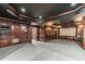 Luxury basement home theater with dark wood paneling at 630 Darlington Commons Ne Ct, Atlanta, GA 30305