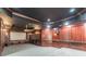 Basement home theater with dark wood paneling and projector at 630 Darlington Commons Ne Ct, Atlanta, GA 30305