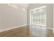 Spacious living room with hardwood floors and large windows at 630 Darlington Commons Ne Ct, Atlanta, GA 30305