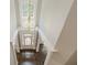 Grand two-story foyer featuring a crystal chandelier and hardwood floors at 630 Darlington Commons Ne Ct, Atlanta, GA 30305