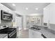 Bright kitchen featuring stainless steel appliances and granite countertops at 1029 Chaterly Ct, Riverdale, GA 30296