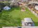 Aerial view showing large backyard and shed at 1207 Eastview Ne Rd, Conyers, GA 30012