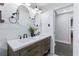 Modern bathroom with double vanity and shiplap feature wall at 1207 Eastview Ne Rd, Conyers, GA 30012