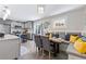 Modern kitchen with gray cabinets, white subway tile, and stainless steel appliances at 1207 Eastview Ne Rd, Conyers, GA 30012