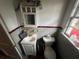 Small bathroom with white vanity and toilet at 2621 Patrick Se Ct, Atlanta, GA 30317