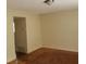 Simple dining room with hardwood floors and neutral walls at 345 Lexington Dr, Lawrenceville, GA 30046