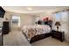 Large main bedroom with floral bedding and ample closet space at 8484 Glenview St, Douglasville, GA 30134