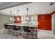 Basement wet bar with granite countertop and stone facade at 2760 Veltre Sw Ter, Atlanta, GA 30311