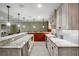 Long granite countertop wet bar in finished basement at 2760 Veltre Sw Ter, Atlanta, GA 30311