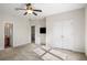 Bright bedroom with ensuite bathroom and ceiling fan at 2760 Veltre Sw Ter, Atlanta, GA 30311