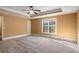 Spacious basement bedroom with neutral carpeting at 2760 Veltre Sw Ter, Atlanta, GA 30311