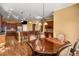 Kitchen dining area with round table and hardwood floors at 2760 Veltre Sw Ter, Atlanta, GA 30311