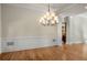 Bright dining room with hardwood floors and elegant chandelier at 2760 Veltre Sw Ter, Atlanta, GA 30311