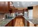 Kitchen boasts granite countertops and ample cabinetry at 2760 Veltre Sw Ter, Atlanta, GA 30311