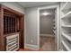 Finished basement with wine cellar, storage shelves, and extra room at 2760 Veltre Sw Ter, Atlanta, GA 30311