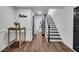 Inviting hallway with dark doors and wood-look flooring at 3569 Lynne Rd, Powder Springs, GA 30127