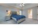 Spacious bedroom with carpeted floor, large windows, and neutral wall colors at 3799 Halisport Nw Ln, Kennesaw, GA 30152