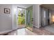 Elegant entryway with marble floors and a green door at 3799 Halisport Nw Ln, Kennesaw, GA 30152