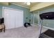 Basement exercise room with a treadmill and exercise bike at 3799 Halisport Nw Ln, Kennesaw, GA 30152