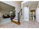 Spacious foyer with staircase and view to living room at 3799 Halisport Nw Ln, Kennesaw, GA 30152