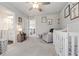 Charming Bedroom with crib, glider, and playful animal art at 4016 Matty Ne Dr, Marietta, GA 30066