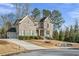 Brick house with two-car garage and landscaped yard at 4016 Matty Ne Dr, Marietta, GA 30066