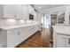 White kitchen with long countertop and built-in microwave at 4016 Matty Ne Dr, Marietta, GA 30066