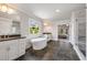 Spa-like bathroom with soaking tub, double vanity, and marble accents at 4016 Matty Ne Dr, Marietta, GA 30066