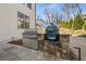 Built-in outdoor kitchen with grill and granite countertop at 4016 Matty Ne Dr, Marietta, GA 30066