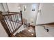 Elegant staircase with dark wood railings and a view of the foyer at 4016 Matty Ne Dr, Marietta, GA 30066