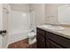 Clean bathroom with tub, toilet and vanity at 757 Galveston Way, Mcdonough, GA 30253