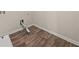 Laundry room with wood-look flooring and dryer vent at 757 Galveston Way, Mcdonough, GA 30253