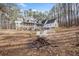 This wooded backyard is the perfect place to escape the hustle and bustle of everyday life at 10 Moss Landing Se Rd, Acworth, GA 30102