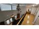 Upper hallway overlooking a sitting area and hardwood floors at 10 Moss Landing Se Rd, Acworth, GA 30102