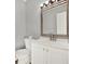 Bathroom with white vanity and decorative mirror at 373 Oak Harbor Trl, Marietta, GA 30066