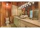 Elegant bathroom with double vanity and granite countertops at 897 Winding Trl, Lawrenceville, GA 30046