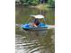 Couple enjoying a paddle boat on the lake at 897 Winding Trl, Lawrenceville, GA 30046