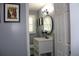 Stylish bathroom with a white vanity and large mirror at 2185 Fairfield St, Smyrna, GA 30080