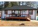 Charming ranch home features a newly renovated exterior, deck, and landscaping at 2185 Fairfield St, Smyrna, GA 30080