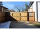 Wooden gate providing access to the backyard at 2185 Fairfield St, Smyrna, GA 30080