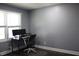 Home office with a desk, two monitors, and gray walls at 2185 Fairfield St, Smyrna, GA 30080