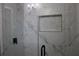 Modern shower with marble tile and glass enclosure at 2185 Fairfield St, Smyrna, GA 30080